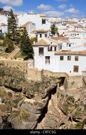 Medieval houses of Ronda town on a high rock in Andalusia region of Spain, Malaga province. Stock Photo