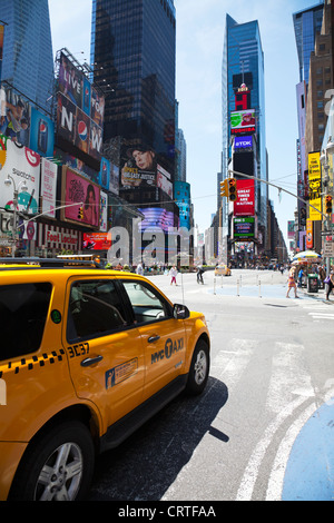 The iconic yellow taxi cab in Times Square, New York city USA. buildings modern cities.Times square new York,times square,times Stock Photo