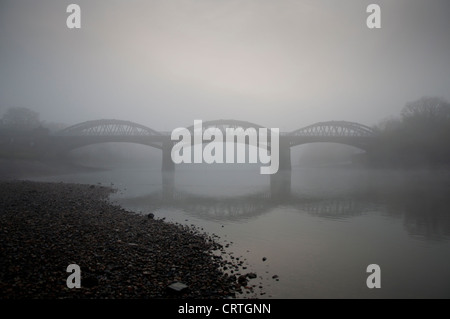 Barnes Bridge in fog, London Stock Photo