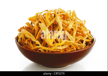 Dried lily buds in a bowl Stock Photo