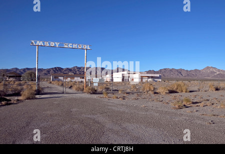 The closed down Amboy school on The Historic Route 66 passes through Amboy in mojave desert, California, United States Stock Photo