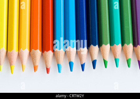 Colorful pencils close-up on white background with shallow dof. Stock Photo