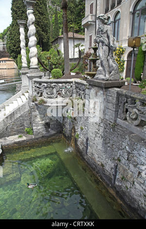 Fish in a pool at the gardens of Villa Monastero Varenna Lake Como Italy Stock Photo