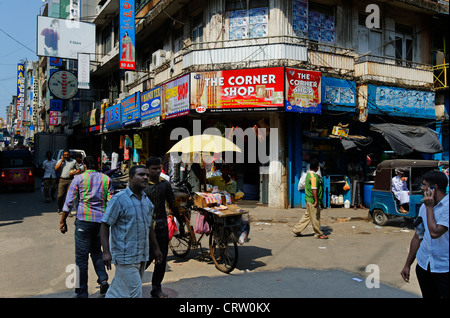 Busy street and corner shop in Pettah Market area of Colombo Sri Lanka,Asia Stock Photo