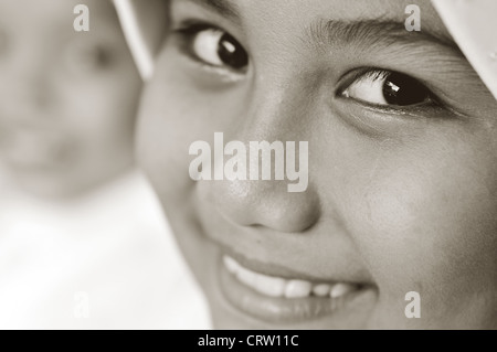 girl at hikmah mosque, tanjung Pinang, Bintan, Indonesia Stock Photo