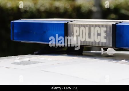 Blue lights on the roof of a police vehicle Stock Photo