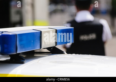 Blue lights on the roof of a police vehicle Stock Photo