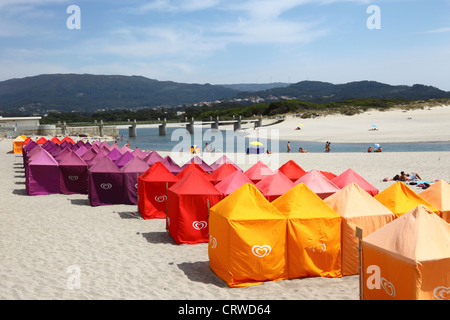 Colourful tents for changing on the beach , Vila Praia de Ancora , near Caminha, Minho Province, northern Portugal