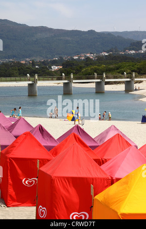 Colourful tents for changing on the beach , Vila Praia de Ancora , near Caminha, Minho Province, northern Portugal