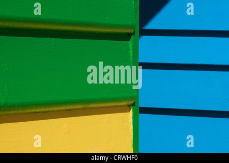 The abstract element of the colourfully painted beach houses are the landmark of the Brighton Beach in Melbourne, Australia. Stock Photo