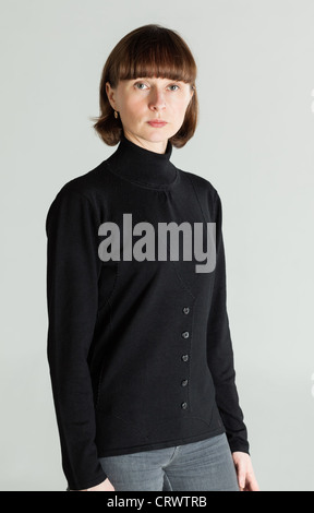 Studio portrait of a serious middle aged woman Stock Photo