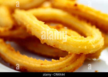 Churros gastronomic scene highlighting breakfast appetizing color and texture Stock Photo