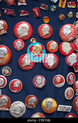 Chairman Mao memorabilia on sale in Dongtai Road Antique Market in Shanghai, China. Stock Photo