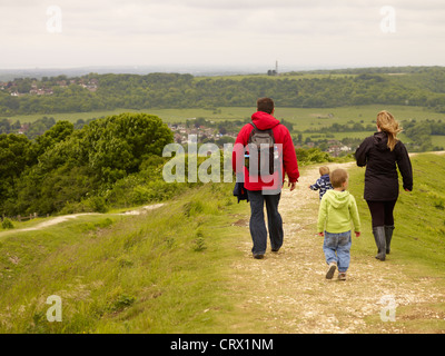 A family out walking on the South Downs at Cissbury ring, West Sussex Stock Photo