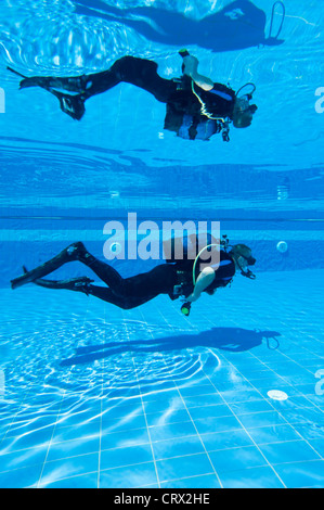 Learning to Scuba Dive in a Swimming Pool Stock Photo