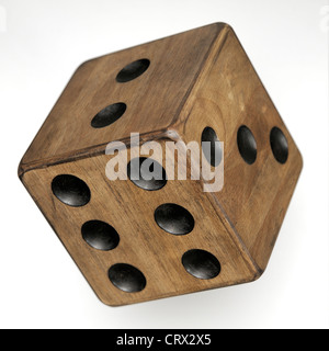 giant wooden dice cube suspended in a white background Stock Photo