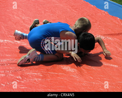 Outdoor Sport Boys wrestling  Stock Photo
