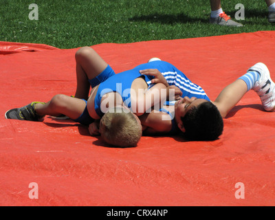 Outdoor Sport Boys wrestling  Stock Photo