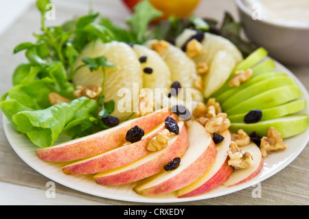 Apple ,Grapefruit and walnut salad Stock Photo