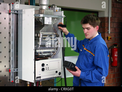 Systems engineers, heating engineer checks a gas heater Stock Photo
