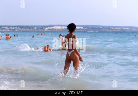 Spain, Mallorca, Dutche vacationer standing in water Stock Photo