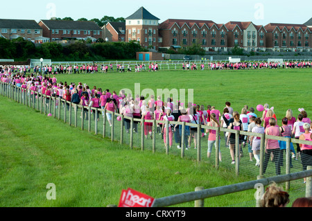 Women in the Race for Life at Stratford Racecourse. Stock Photo