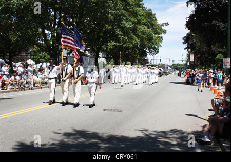 The U.S. Navy Band Northeast participates in the Braintree July 4th Celebration Parade during Boston Navy Week 2012. Boston Navy Week is one of 15 signature events planned across America in 2012. The eight-day long event commemorates the bicentennial of the War of 1812, hosting service members from the U.S. Navy, Marine Corps and Coast Guard and coalition ships from around the world. Stock Photo