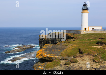 Noup Head lighthouse built on headland seacliffs to warn ships off North Shoal on Westray Island Orkney Islands Scotland UK Stock Photo