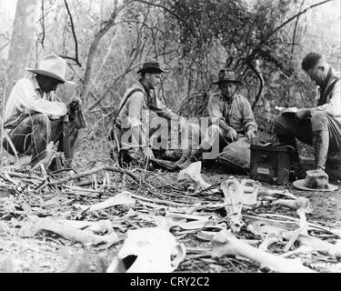 A movie still from Manhunt in the Jungle (1958)  recreating the 1928  Dyott expedition of 1928 in search of Col. Percy Fawcett Stock Photo