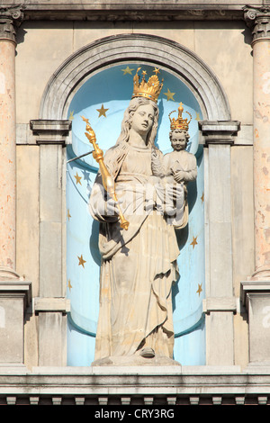 Statue of Madonna with child inside a niche of the town hall in Antwerp, Belgium Stock Photo