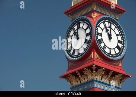 The freshly painted victorian Jubilee clock tower on Weymouth seafront was erected in 1887 to mark fifty years of Queen Victoria’s reign. Dorset, UK. Stock Photo