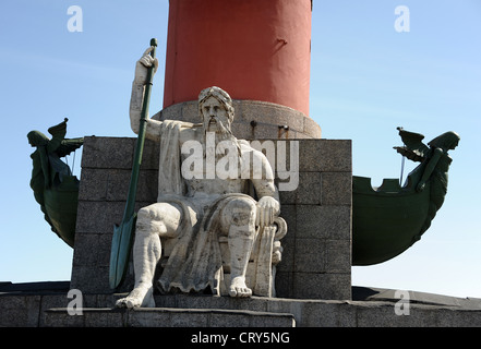 Mythical sea god on one of the  Rostral Columns situated on Strelka, the eastern tip of Vasilievsky island in St. Petersburg Stock Photo