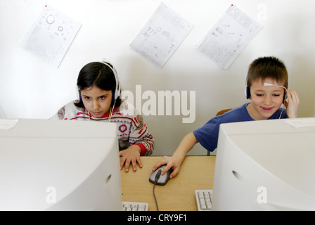 Computer course for children in primary school Stock Photo