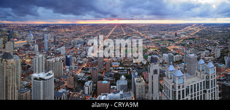 Chicago skyline panorama aerial view with skyscrapers with cloudy sky at sunset. Stock Photo