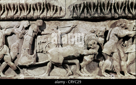 Treasury of Siphnos (525 B.C.). North frieze depicting the battle between gods and giants. Detail. Delphi Archaeological Museum. Stock Photo