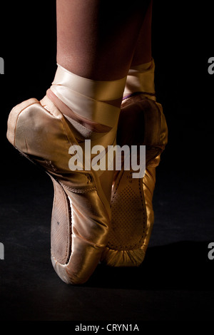 An old pair of pointe shoes. Self Portrait. Stock Photo