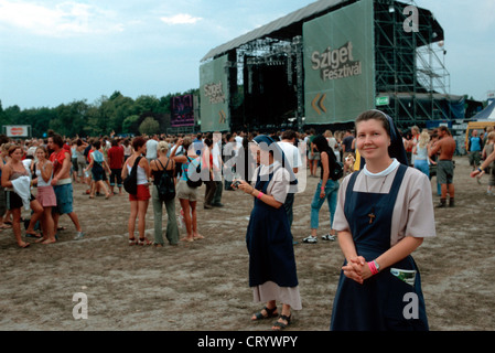 Two nuns in front of the main stage Stock Photo