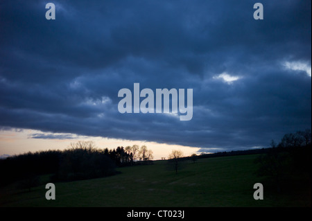 Rainstorm weather front above Swinbrook in the Cotswolds, Oxfordshire, UK Stock Photo