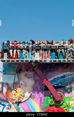 The 'Miami Trip' fairground ride in action Stock Photo