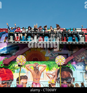 The 'Miami Trip' fairground ride in action Stock Photo