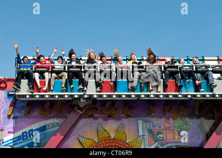 The 'Miami Trip' fairground ride in action Stock Photo