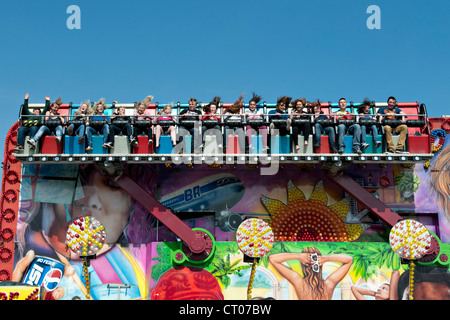 The 'Miami Trip' fairground ride in action Stock Photo