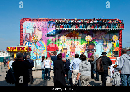 The 'Miami Trip' fairground ride in action Stock Photo