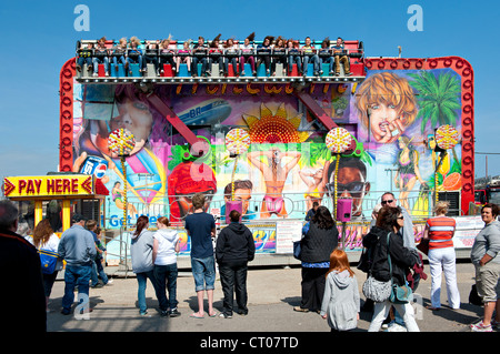 The 'Miami Trip' fairground ride in action Stock Photo - Alamy