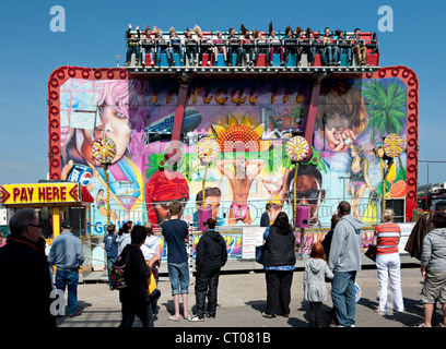 The 'Miami Trip' fairground ride in action Stock Photo