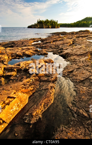 Rocky shore along Lake Superior at Split Rock Lighthouse State Park in northern Minnesota. Stock Photo