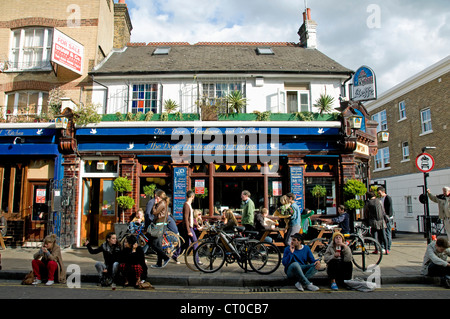 People outside The Dove Freehouse and Kitchen, Broadway Market, Hackney, London England UK Stock Photo