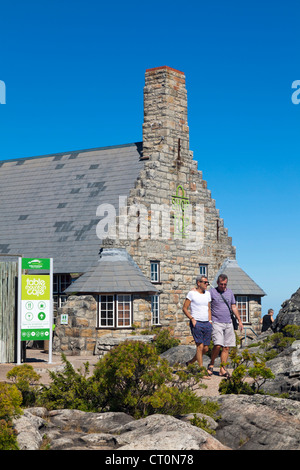 Middle-aged gay couple at Table Mountain cafe, on top of Table Mountain, Cape Town, South Africa Stock Photo