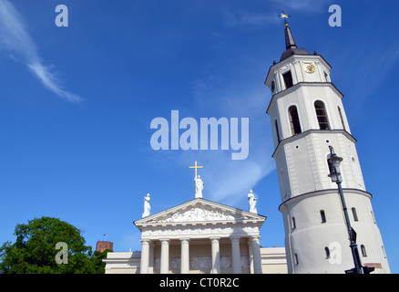 Vilnius cathedral bell tower and Gediminas castle fort on high hill against cloudy sky. Stock Photo