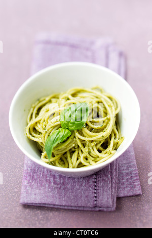 Close up of bowl of pesto pasta Stock Photo